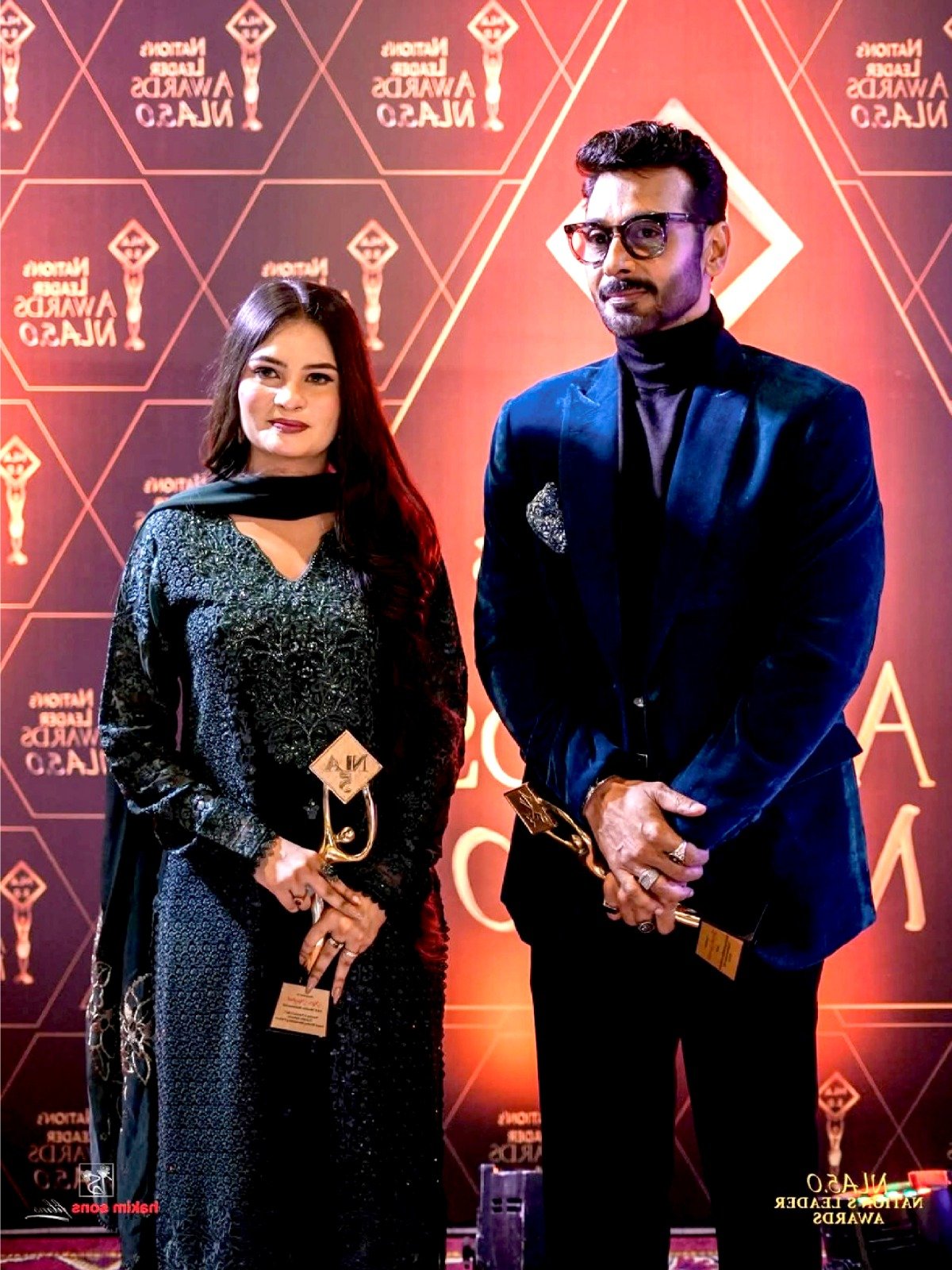 Mrs. Mughal with celebrity host and model Faysal Quraishi at Nation's Leader Awards NLA 5.0